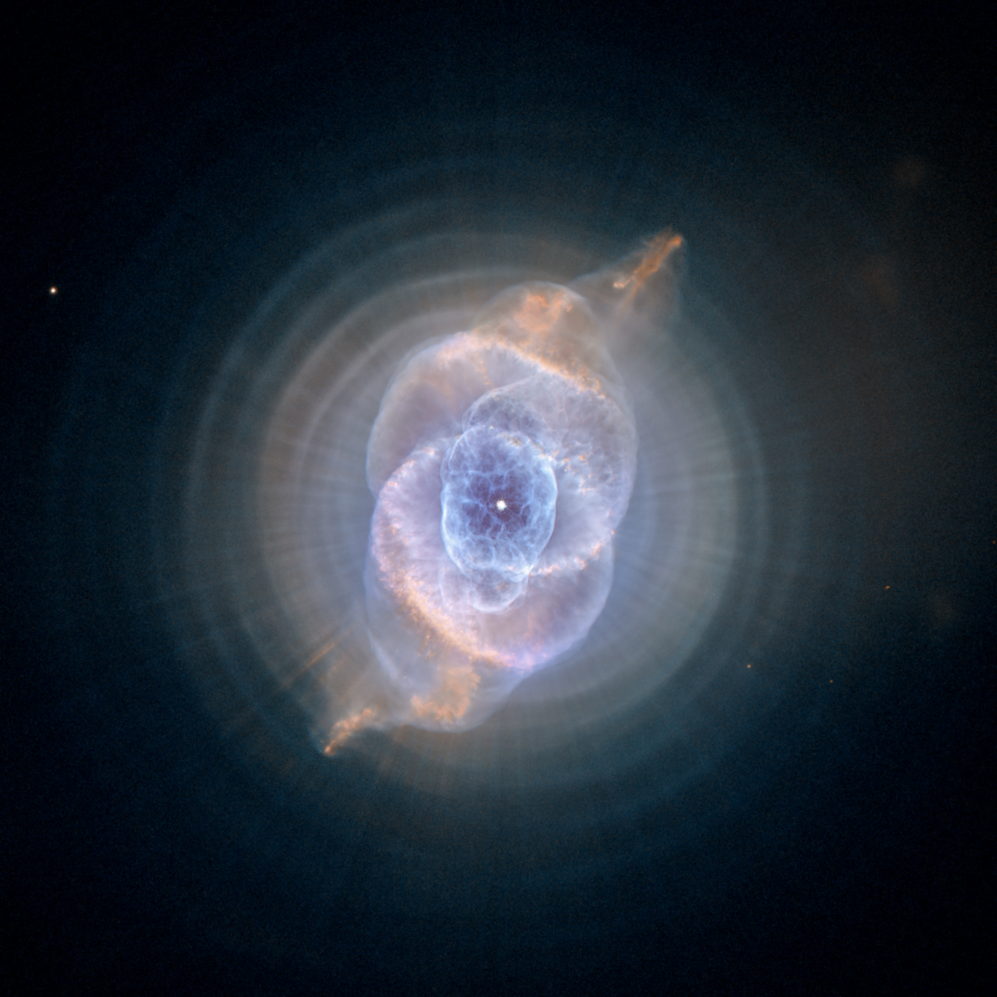Hubble Space Telescope image of the Cat's Eye Nebula (NGC 6543), a bright planetary nebula with concentric shells