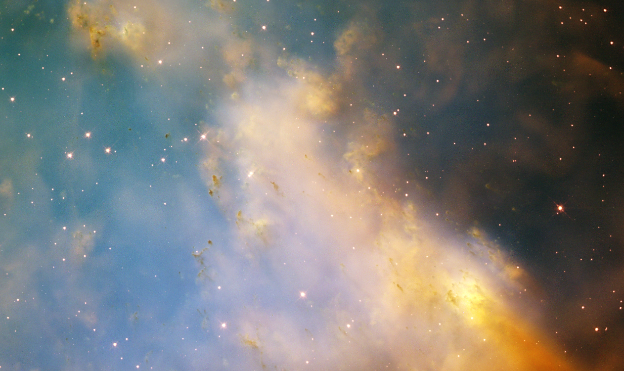 Hubble Space Telescope close-up of the Dumbbell Nebula (M27) showing knots of glowing gas around the central white dwarf