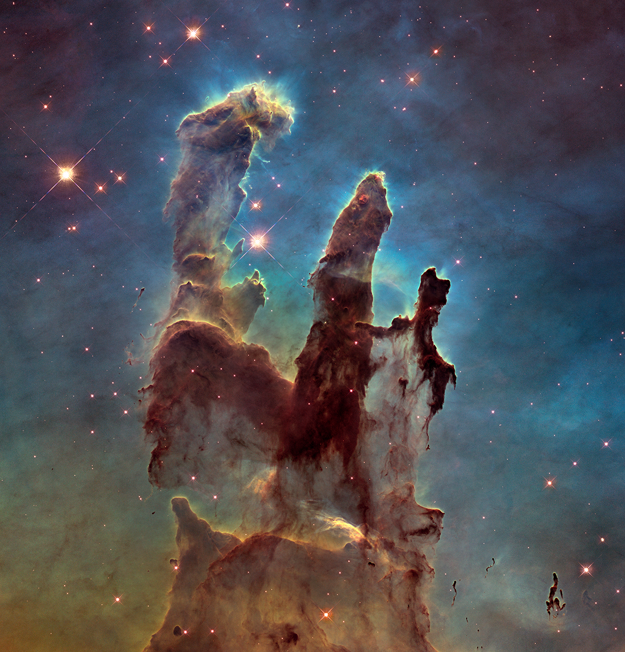 The Pillars of Creation in the Eagle Nebula, imaged by NASA's Hubble Space Telescope